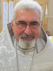Священник Адриан Алауи